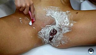 POV Close Up Shaving Her Unshaven Pussy in Bathroom