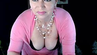 mature woman curiously handles bottles in a bold private display