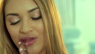 blonde latina with natural tits sucks glass dildo then strips to finger her pierced pussy
