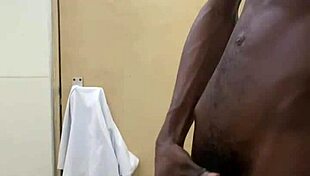 Big Black Cock Busts Huge Nut in Public Toilet