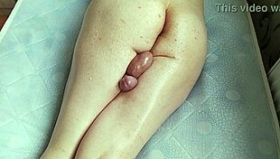 oiled shemale crossdresser spanks shiny big ass cheeks solo