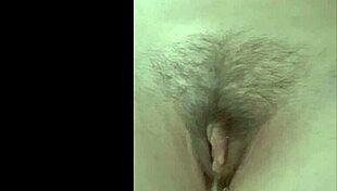 she soaks clothes ripping wet while pissing everywhere in amateur clip