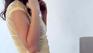 dark haired teen stands horny before mirror undressing her shaved body slowly