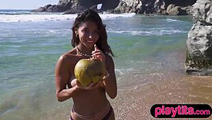 Watch this petite Latina strip at the beach showing off her big wet ass