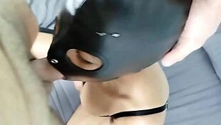 petty slut sucks cock deep with mask