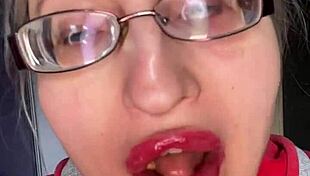 Giantess with big lips eats snickers bar