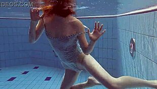 sexy petite russian teen pornstar libuse flaunts small tits at beach pool underwater with boyfriend