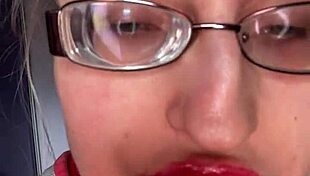 Giantess with big lips eats snickers bar