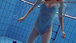 sexy petite russian teen pornstar libuse flaunts small tits at beach pool underwater with boyfriend