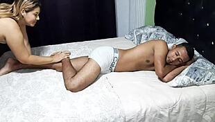 Ella Gives Oiled Footjob To Wake Him