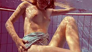 sexy petite russian teen pornstar libuse flaunts small tits at beach pool underwater with boyfriend