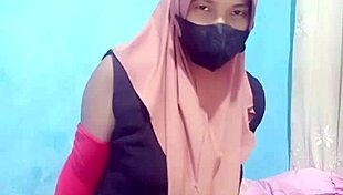Indonesian hijab girl masturbates with dildo