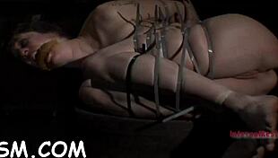 sexy girl enjoys toy play in bondage contest