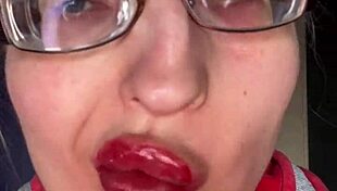 Giantess with big lips eats snickers bar