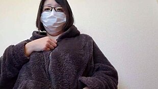 a married woman masturbates while rubbing her breasts