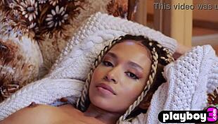 Petite black milf model posed in stockings during her solo session