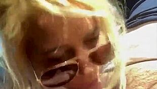 streetwalker in sunglasses gives blowjob and takes facial
