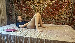 A guy gives a girl an enema at home