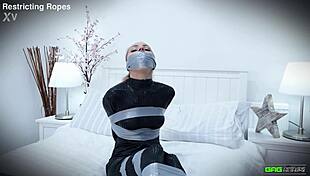 Chloe toy gets tape bondage and gagged in catsuit