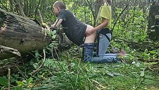 Mistress fucks slave outdoors with strapon