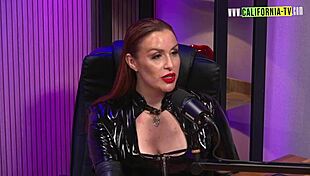 The redhead enjoys men being submissive using her big tits and toys