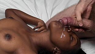 Ebony girl sucks dick with toy in her butt