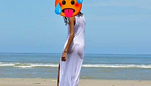 Nude model does public beach photoshoot with small tits