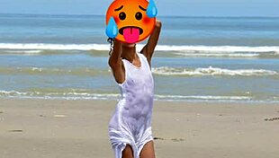Nude model does public beach photoshoot with small tits
