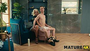 Mature lady in uniform uses her big tits instead of cleaning.