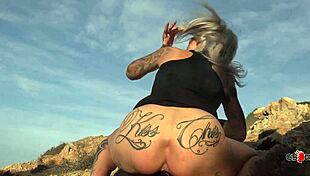 slutty tattoo milf enjoys outdoor beach sex
