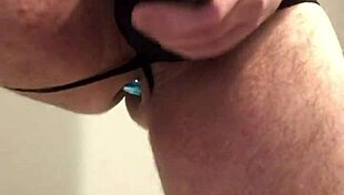 Sun692 shows black lingerie with butt plug