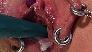 Pierced pussy reaches creampie orgasm