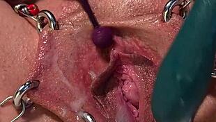 Pierced pussy reaches creampie orgasm
