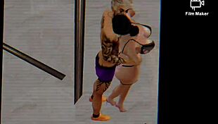 couple kissing in public caught on security camera